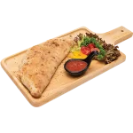 Classic Pepperoni Calzone Pepperoni calzone on a wooden board with dipping sauce